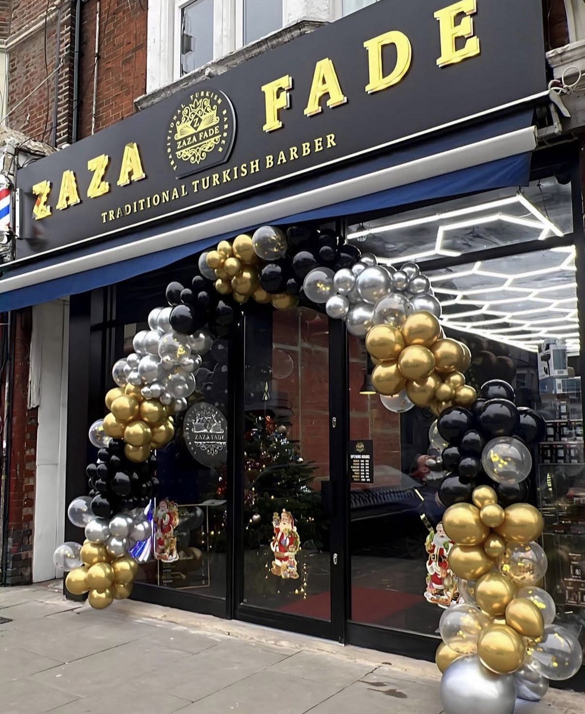 Zaza Fade shop exterior with balloon arch
